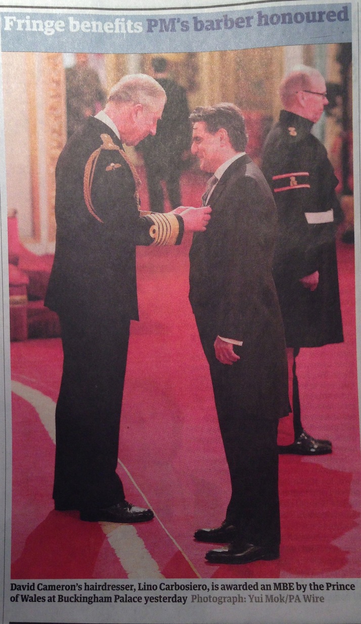 Lino Carbosiero receives his MBE from Prince Charles